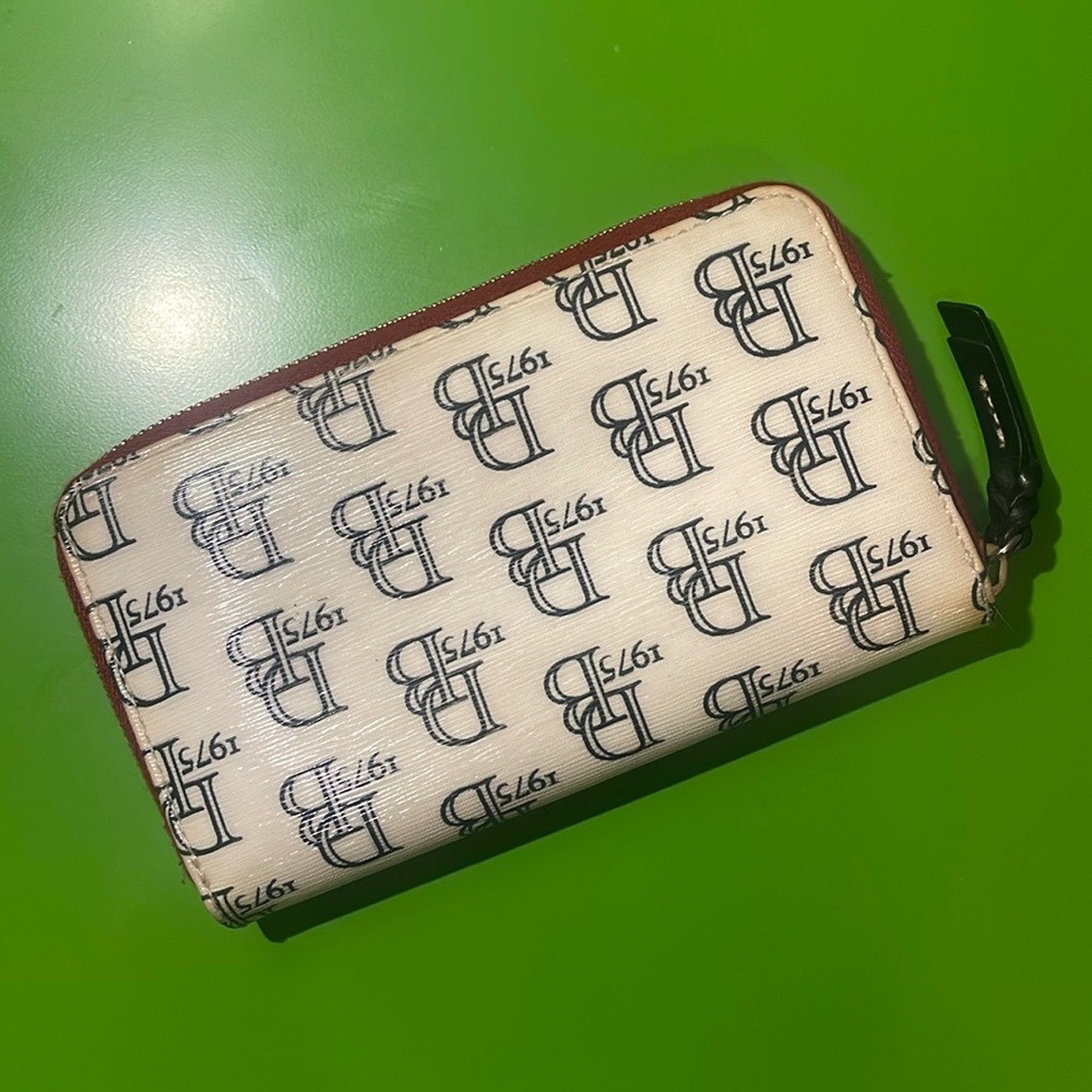 Vintage Dooney & Bourke Coated Canvas Wallet.